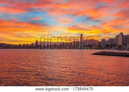 Benidorm city orangy red twilight scenery, Spain.