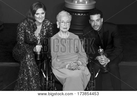 Katherine Johnson, Ezra Edelman and Caroline Waterlow at the 89th Annual Academy Awards - Press Room held at the Hollywood and Highland Center in Hollywood, USA on February 26, 2017.