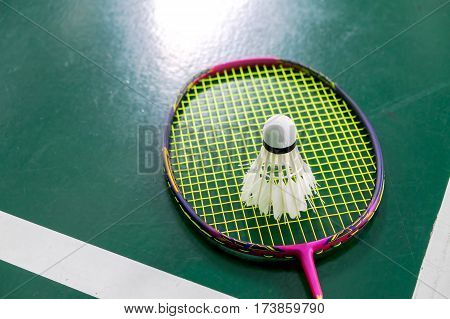 bad condition badminton ball with badminton racquet after hard trainning