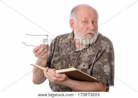 Handsome bald and bearded senior man distracted when reading a book, isolated on white background