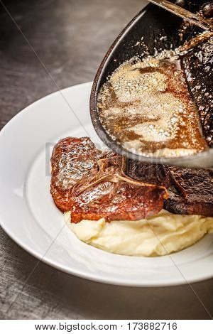 Chef Pouring Gravy Sauce