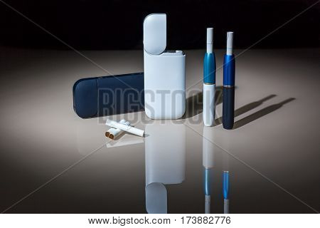 New technology of electronic cigarettes system of heating of tobacco of IQOS