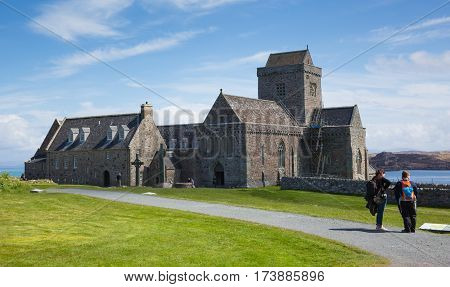IONA, SCOTLAND, UK-MAY 6th 2016:  Beautiful sunny spring weather was enjoyed by visitors to historic Iona Abbey, Isle of Iona, Scotland on Friday 6th May 2016