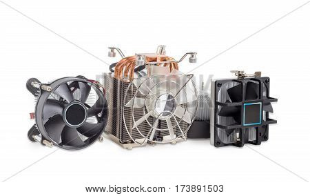 One active CPU cooler with a large finned heatsink fan copper thermal pad with heat pipes and several various CPU coolers with aluminum finned heatsinks and fans on a light background