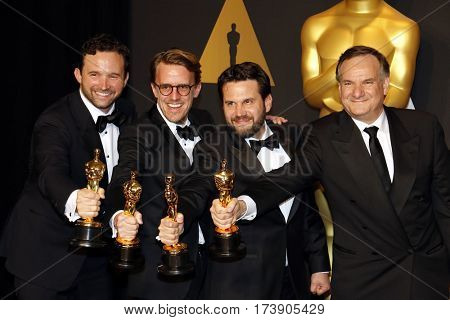 Dan Lemmon, Andrew R. Jones, Adam Valdez and Robert Legato at the 89th Annual Academy Awards - Press Room held at the Hollywood and Highland Center in Hollywood, USA on February 26, 2017.