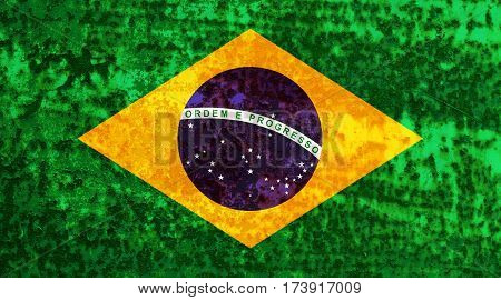 Brazilian flag rusty metal texture. Abstract flag background