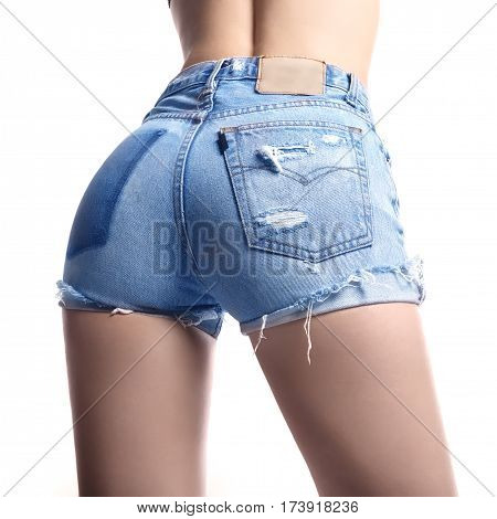 Sexy Woman In Fashion Blue Jeans Shorts. Perfect Hot Booty And Erotic Curves Hips