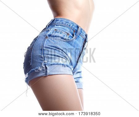 Sexy Woman In Fashion Blue Jeans Shorts. Perfect Hot Booty And Erotic Curves Hips