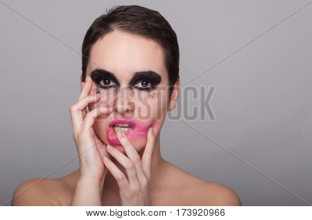 Dramatic Girl Face With Pink Smeared Lipstick