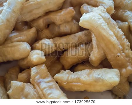 Close up of Patongko deep-fried dough stick