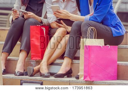 Close-up of happy young group of women with shopping bags after shopping Happy Life Style Concept.