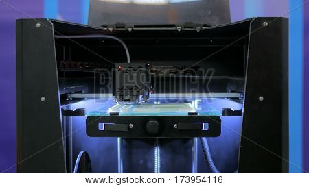 Three dimensional printing machine. 3D printer during work