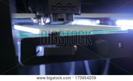 Three dimensional printing machine. 3D printer during work