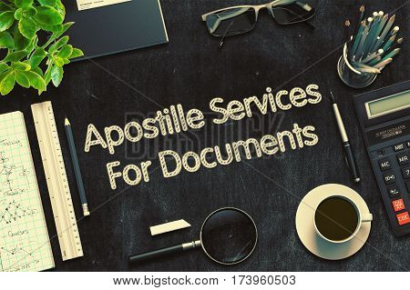 Apostille Services For Documents - Black Chalkboard with Hand Drawn Text and Stationery. Top View. 3d Rendering. Toned Illustration.