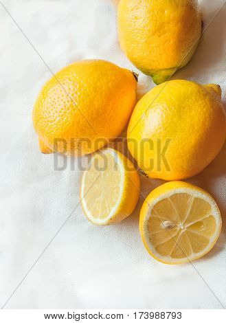 lemons cut on white background with natural light