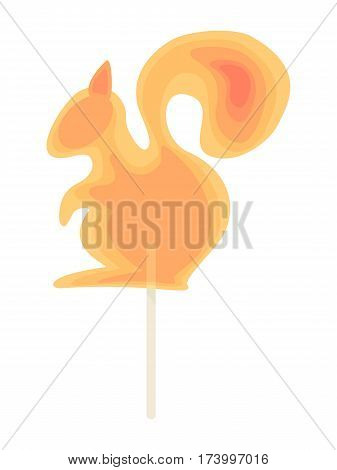 Caramel candy on a stick in the form of squirrel. Festive dessert for the holidays for children.