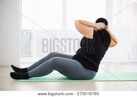 Weight Loss, Fitness, Sport, Exercising, Home Workout, Training And Lifestyle. Young Plus Size Woman