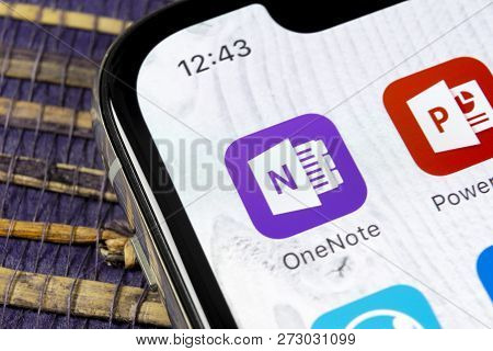 Sankt-petersburg, December 5, 2018: Microsoft Onenote Office Application Icon On Apple Iphone X Scre