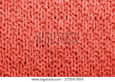 Knitted Fabric Texture Living Corel Color. Trendy Concept Color Of The Year.