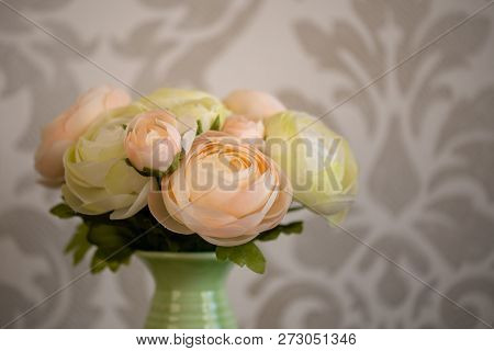 Beautiful White Roses In A Green Vase