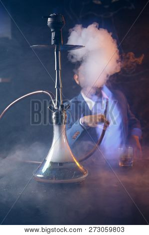 Clay Shisha Bowl With Craft Flawoured Tobacco And Red Hot Coconut Coil With Hookah Smoke Black Backg