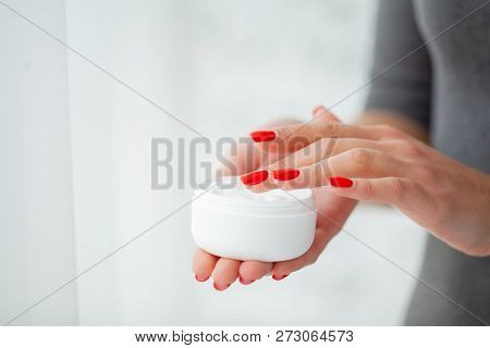 Scin Care. Beautiful Woman Hands With Cream