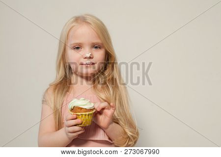 Beautiful Little Girl Blonde With Cake And Candy Portrait Of Food