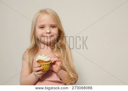 Beautiful Little Girl Blonde With Cake And Candy Portrait Of Food