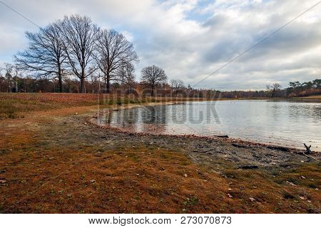 Largely Dried Up Lake After A Prolonged Drought In The Summer Period. It Is An Old Clay Quarry In Th