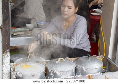 Hanoi, Vietnam - January 06, 2017: An Unidentified Woman Is Preparing Banh Cuon At Market In Hanoi