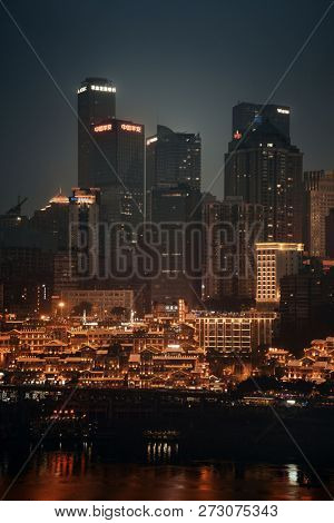 CHONGQING, CHINA â MARCH 13: Hongyadong shopping complex at night on March 13, 2018 in Chongqing. With 17M population, it is the most populous Chinese municipality.