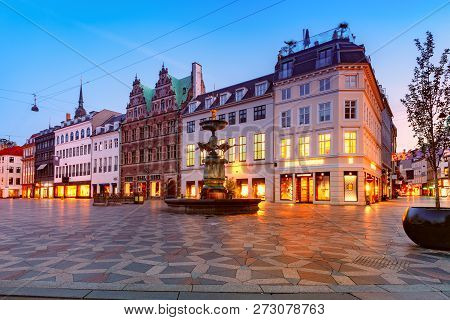 Stork Fountain On The Amagertorv Square, Stroget Street During Morning Blue Hour, Copenhagen, Capita