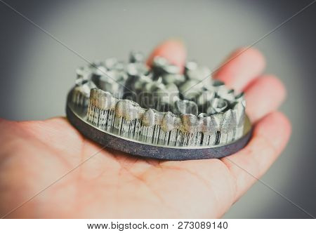 Man Is Holding Object Printed On Metal 3d Printer.