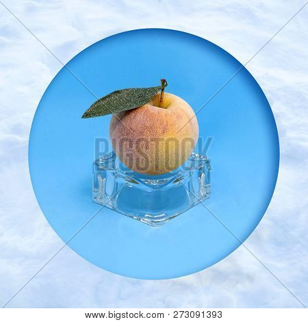 Frozen Apple On Ice Cube In Snow Frame. Creative Concept: Quickly Frozen Fruits And Vegetables Retai