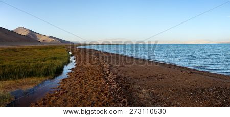 Karakul Lake And Pamir Range In Tajikistan. Landscape Around Pamir Highway M41 International Road, R