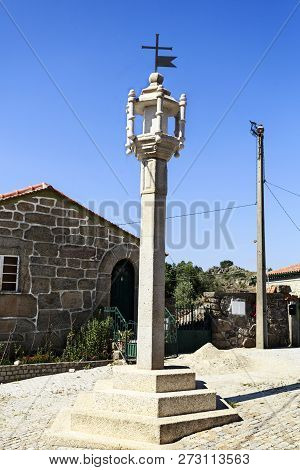 View Of The 16th Century Granite Cage Pillory, Totally Rebuilt In The 21st Century, Facing The Local