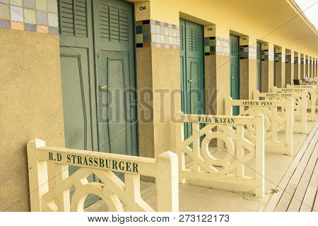 Deauville, France - August 20, 2018: Promenade Des Planches, Where Beach Closet Are Dedicated To Fam