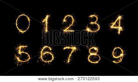 Beautiful Set Of Fireworks Numbers. Burning Sparkler Numbers Isolated On Black Background. Numbers O