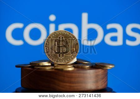 Tula, Russia - October 31, 2018: - Bitcoin Btc On Stack Of Cryptocurrencies With Coinbase Logo In Ba