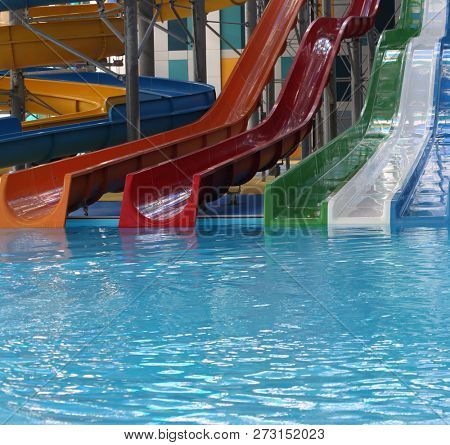Water park. Blue pool slide swimming. Aquapark.