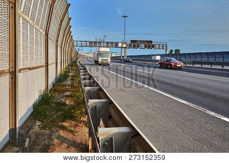 Saint Petersburg, Russia - August 28, 2018: Truck And Several Cars Drive Along The Bypass Road With 