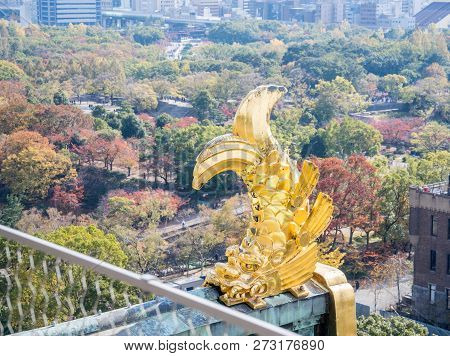 Osaka, Japan, November 25, 2018: Shachihoko (shachi) At World Famous Osaka Castle Roof In Autumn Wit