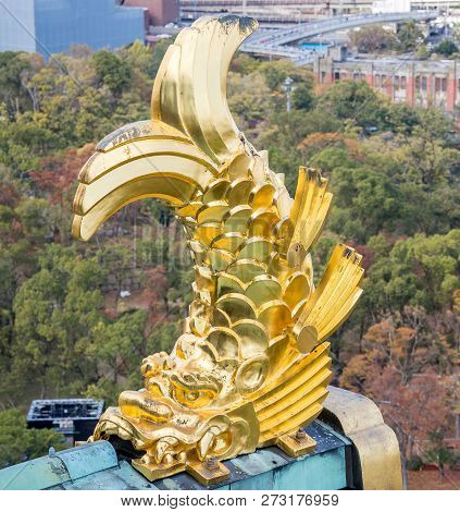 Osaka, Japan, November 25, 2018: Shachihoko (shachi) At World Famous Osaka Castle Roof In Autumn Wit