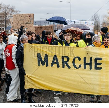 Strasbourg, France - Dec 8, 2018: Crowd Of People Marching In Central Strasbourg At The Nationwide P