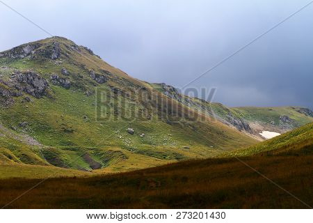 Photo Of Nature - Pretty Petrous Mountain Cliff With Light Blue Sky
