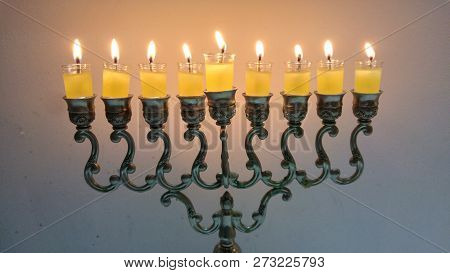 Vintage Oil Chanukiah - Traditional Jewish Candelabrum With Nine Candles Burning During The Holiday 