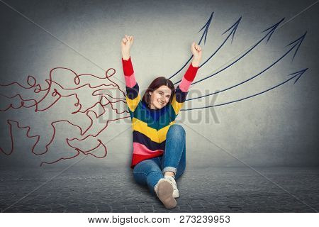 Cheerful Excited Young Woman Raising Hands Up Sitting On The Floor Happy Emotion Concept Of Informat