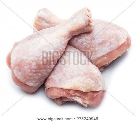 Raw chicken legs isolated on white background.
