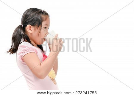 Cute Asian Girl Drinking Fresh Milk Isolated On White Background, Growth And Healthy Concepy