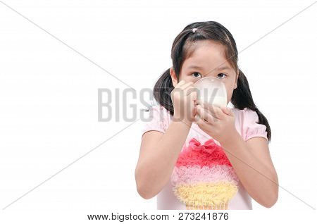 Cute Asian Girl Drinking Fresh Milk Isolated